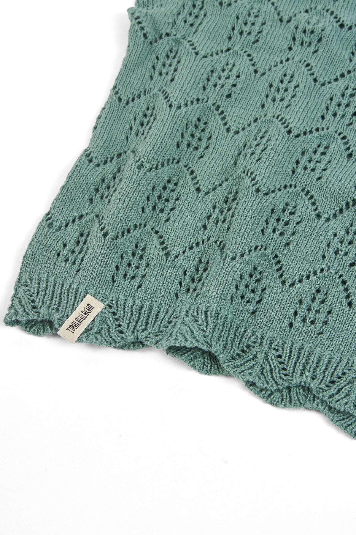 Top calado de tricot azul claro
