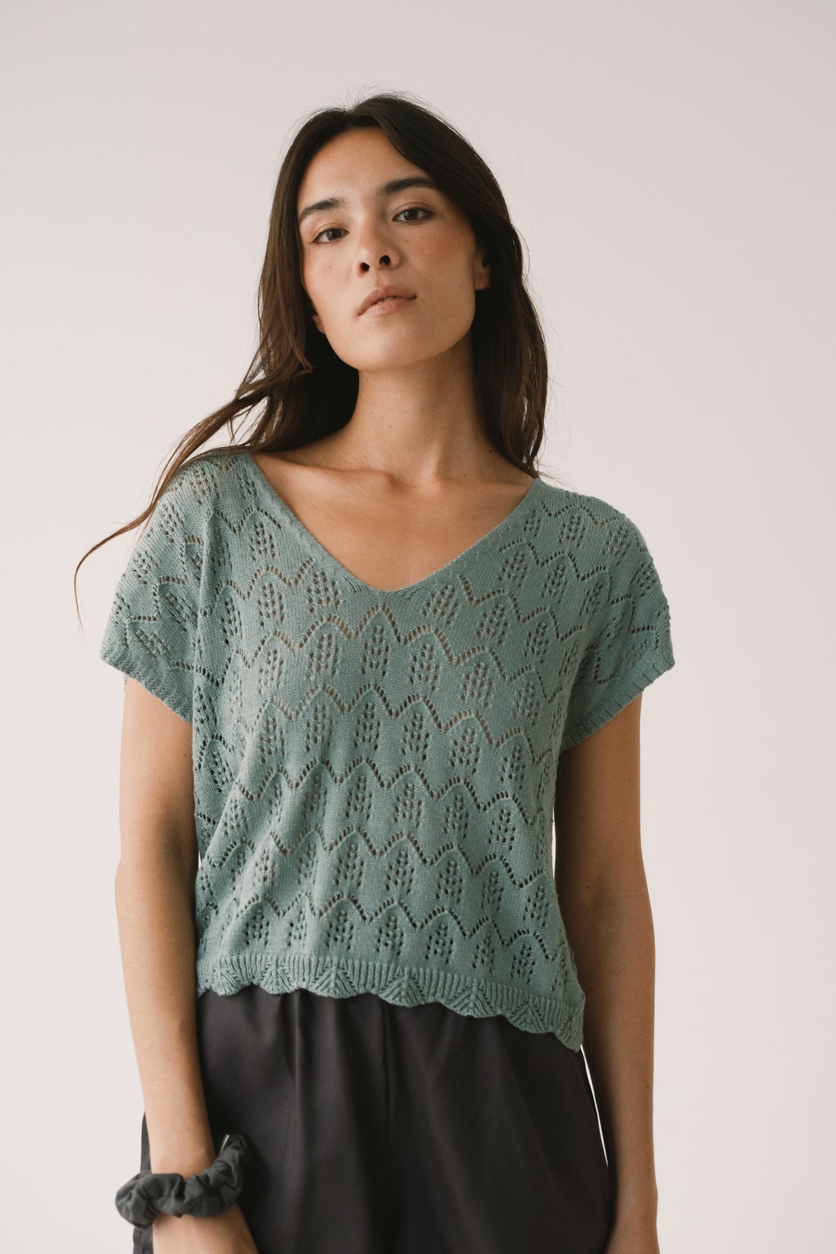 Top calado de tricot azul claro