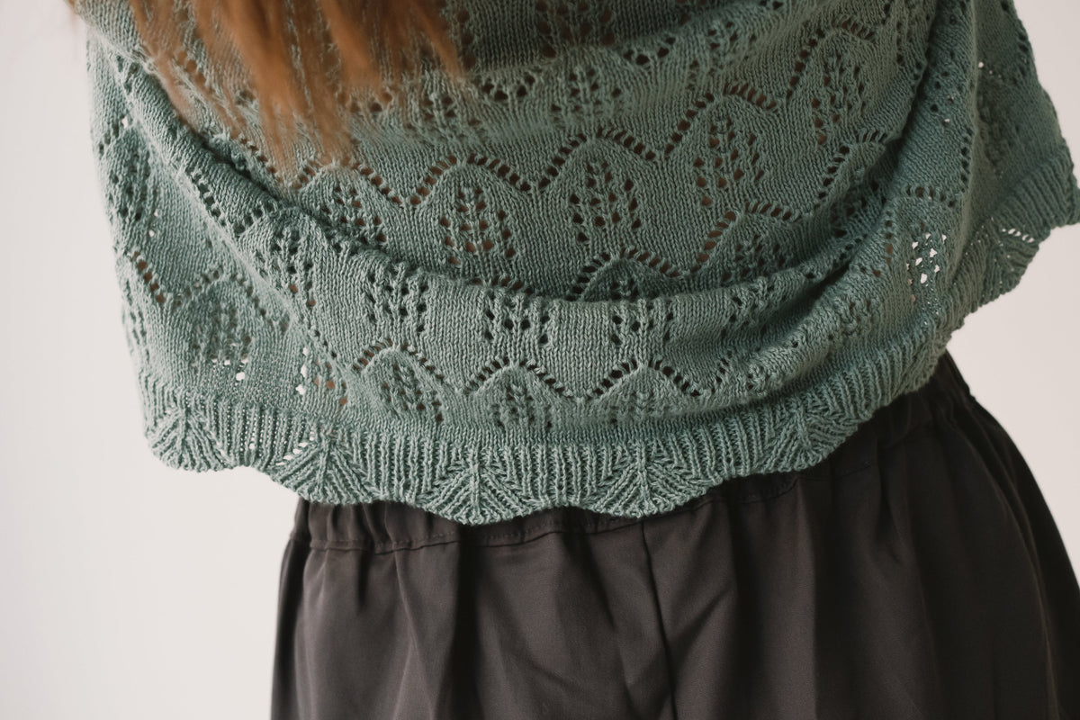 Top calado de tricot azul claro