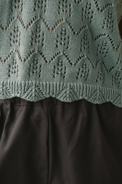 Top calado de tricot azul claro