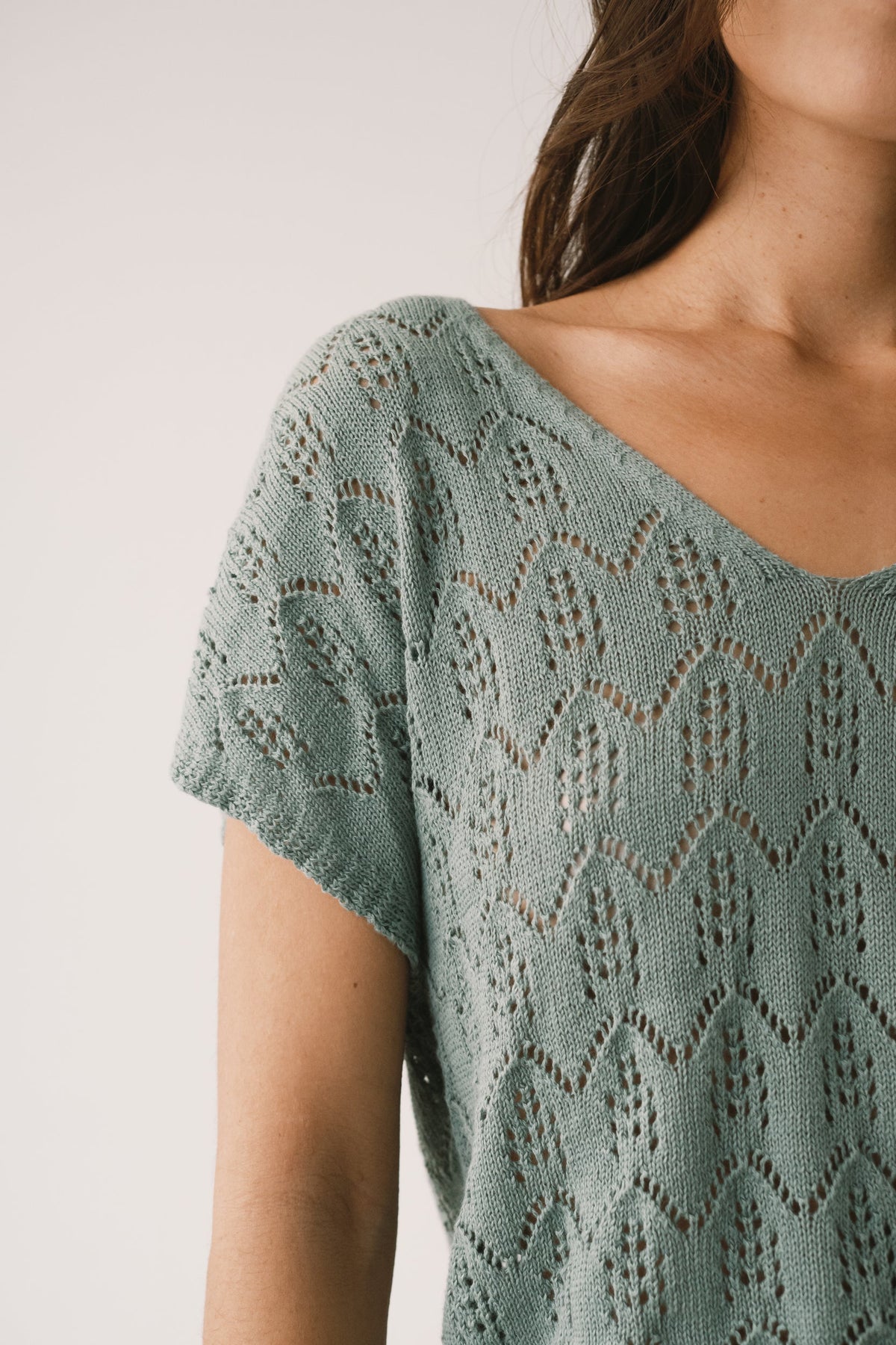Top calado de tricot azul claro