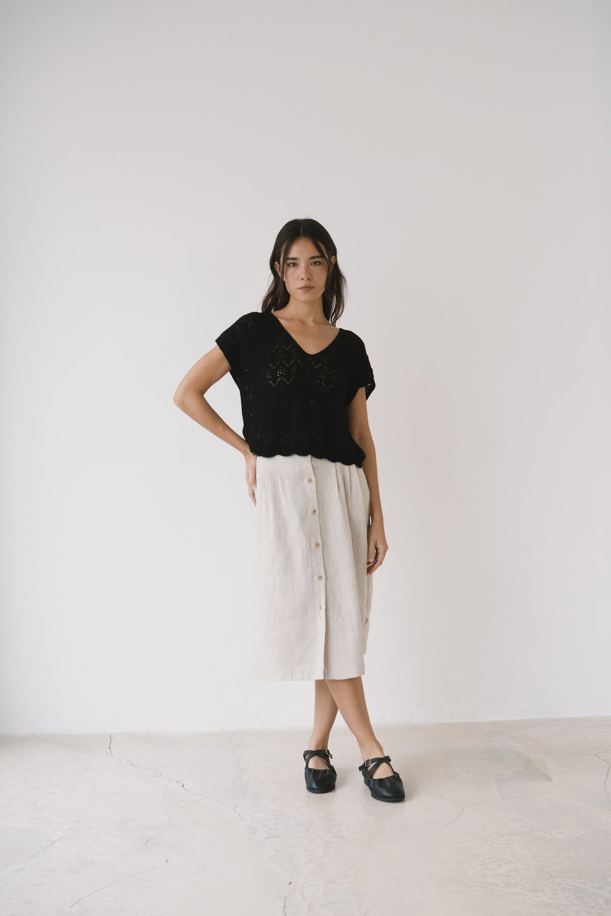 Top calado de tricot negro