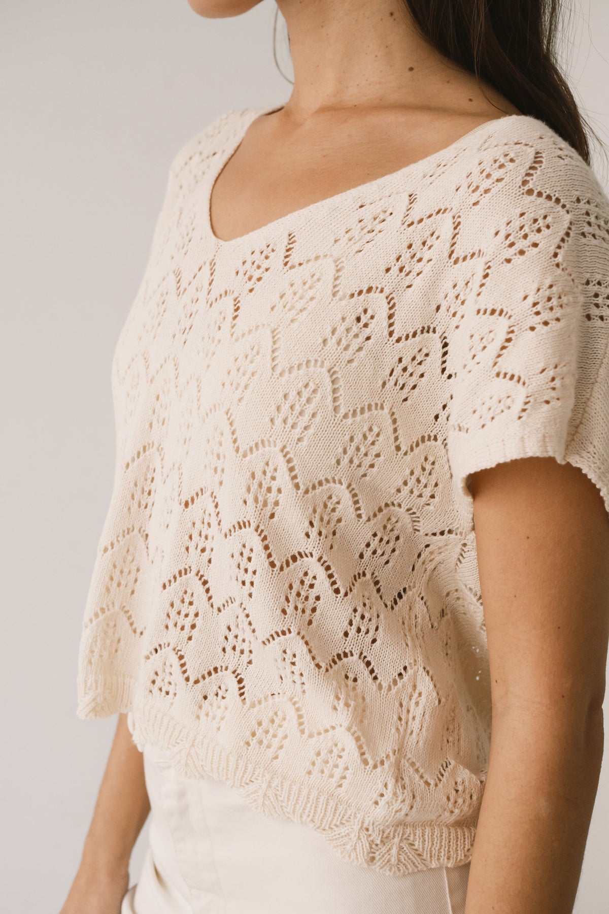 Top calado de tricot crudo